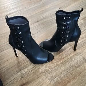 Black leather boot heel with open toe